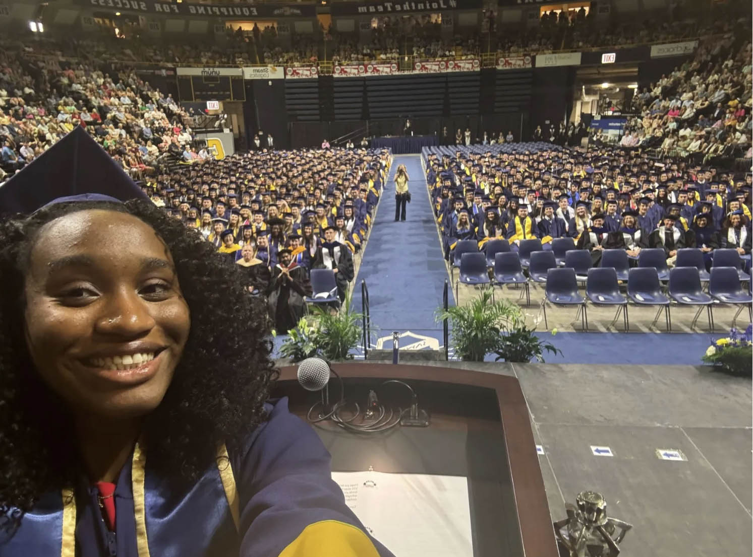 Following her remarks to UTC students of the Gary W. Rollins College of Business and the College of Health, Education and Professional Studies at the 2024 afternoon undergraduate commencement, Student Government Association President Chamyra Teasley took a selfie with the graduates.
